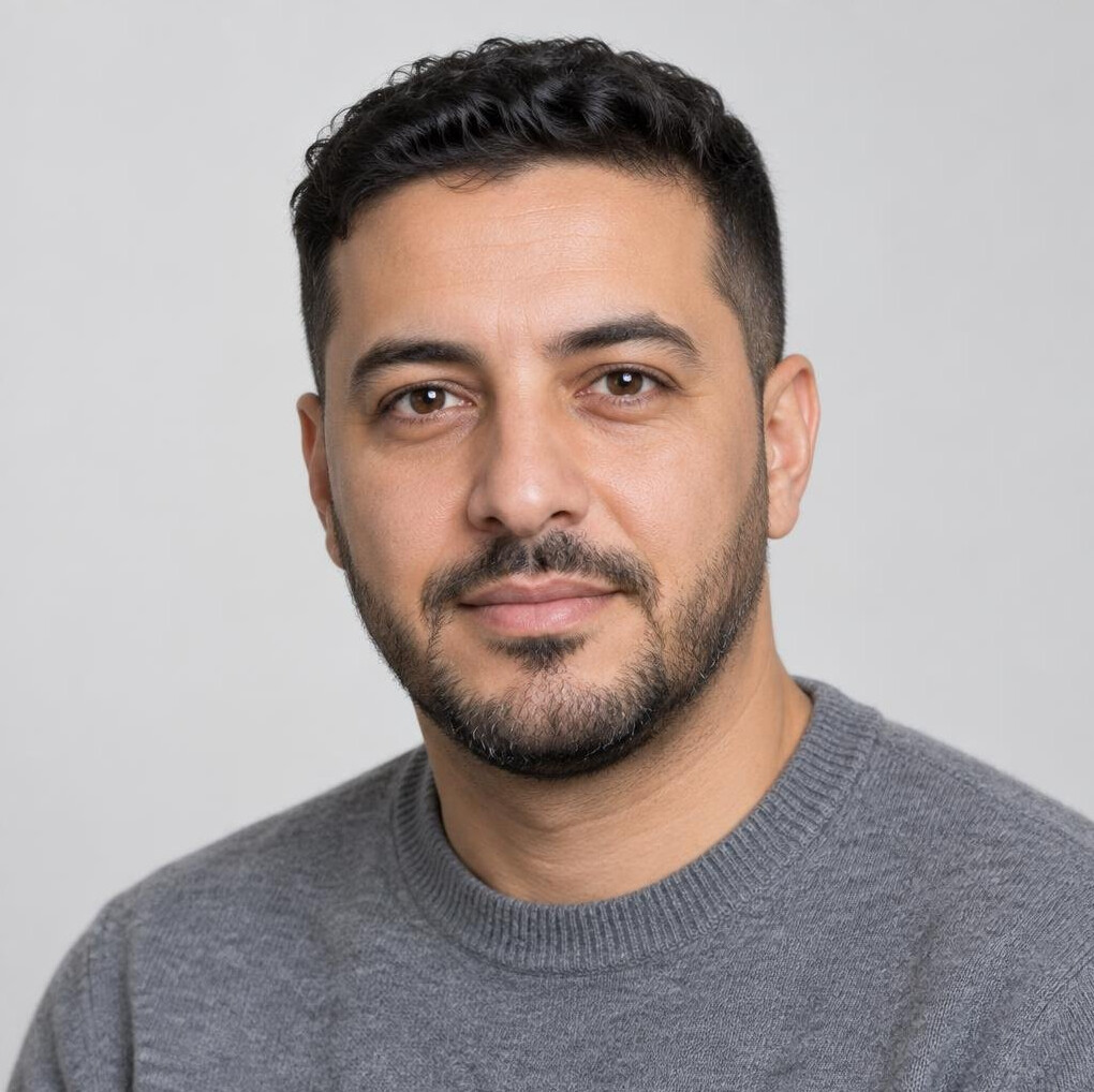 Portrait of a bearded man looking at the camera
