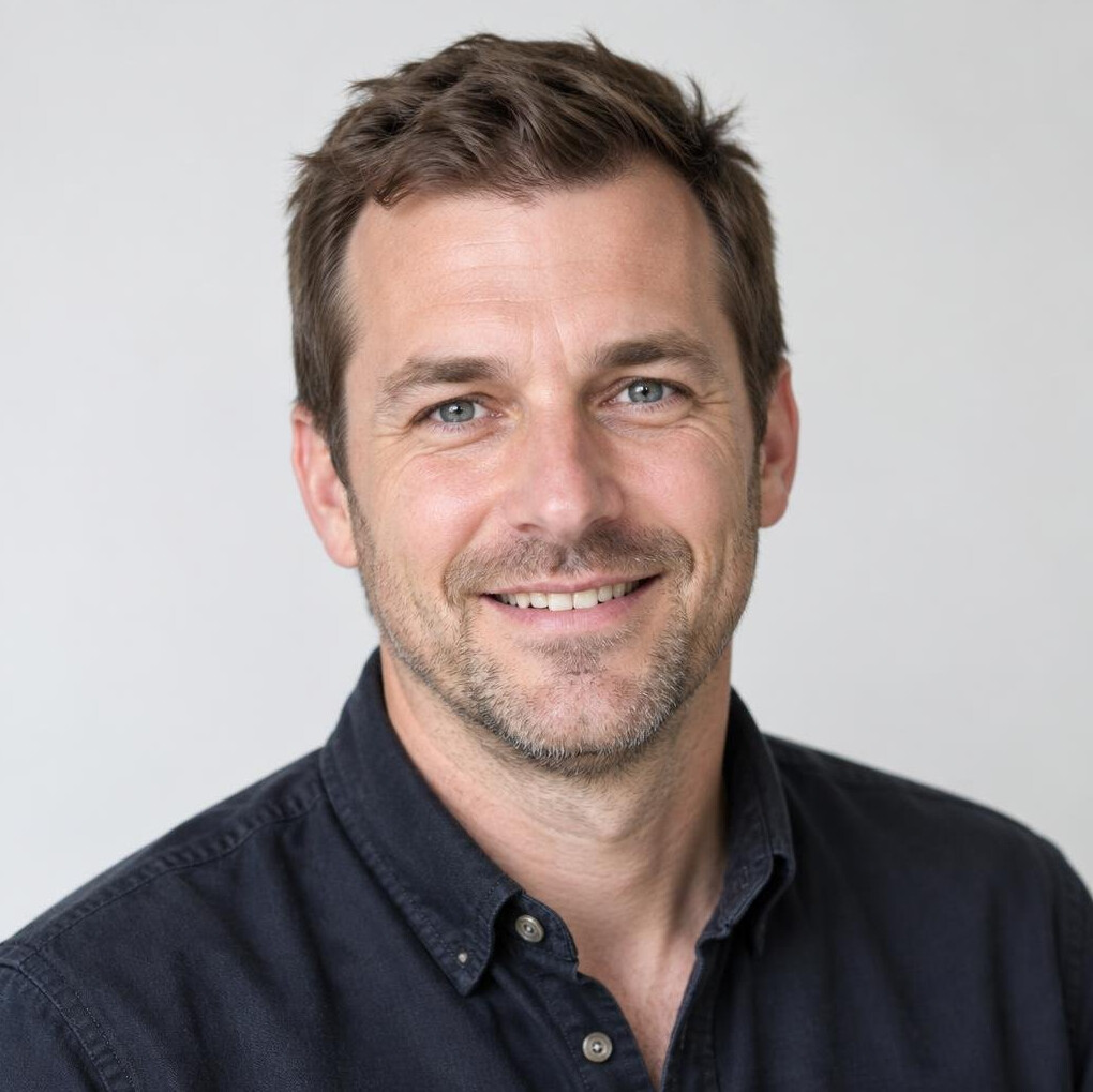 Portrait of a smiling man in a casual shirt